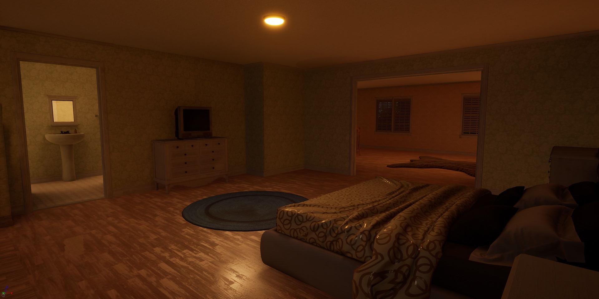 A bedroom with a patterned bedspread, a dresser with an old television, and a bathroom off to the left.